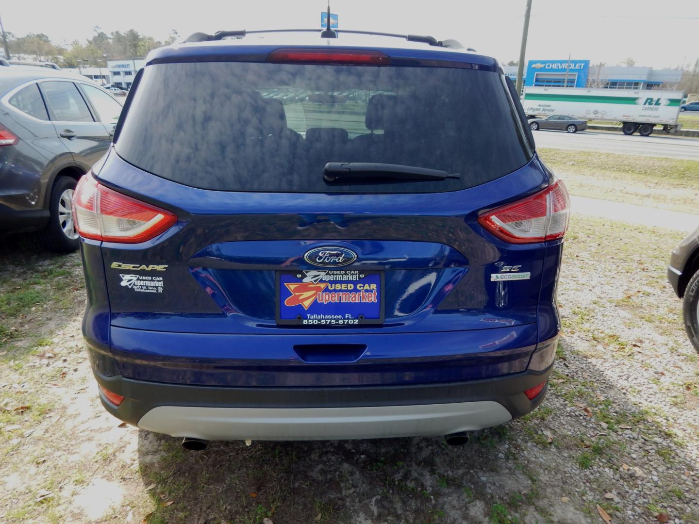 2013 Blue /Gray Ford Escape SE (1FMCU0GX3DU) with an 1.6L 4 cyl. engine, Automatic transmission, located at 3120 W Tennessee St, Tallahassee, FL, 32304-1002, (850) 575-6702, 30.458841, -84.349648 - Photo#3